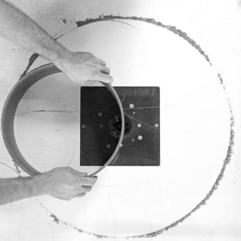 Evetts drums craftsman hand cutting bearing edges on router table