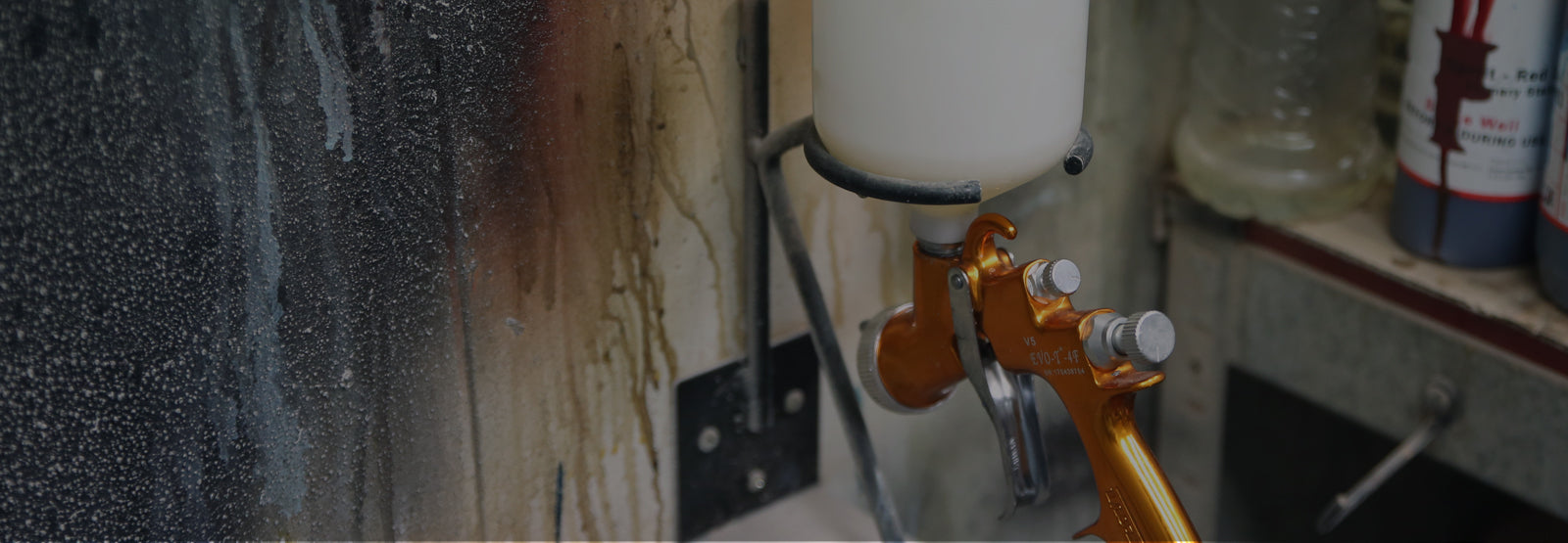 Evetts spray gun in spray booth