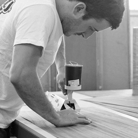 Evetts craftsman Steve Crawley stitching veneer